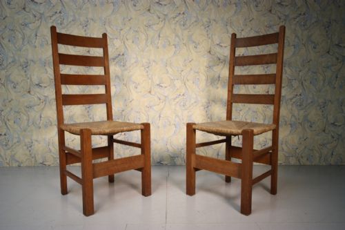 A True Pair of Heals Antique Oak Letchworth Chairs.
