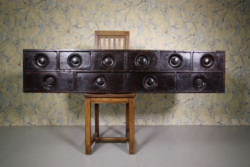 English Bank of Antique Apothecary Drawers in Mahogany.