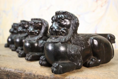 Four Georgian Antique Ebony Carved Lions.