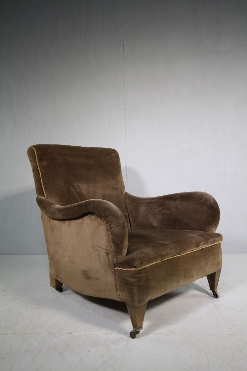 Shapely English Antique Upholstered Armchair.
