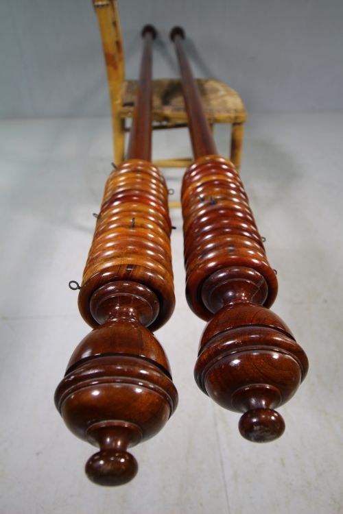 Pair of Large Antique Mahogany Curtain Poles & Rings.