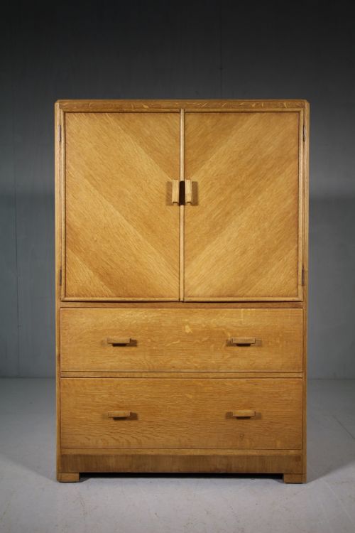 Labelled 1920'S Heals of London Oak Tall Boy Cupboard.