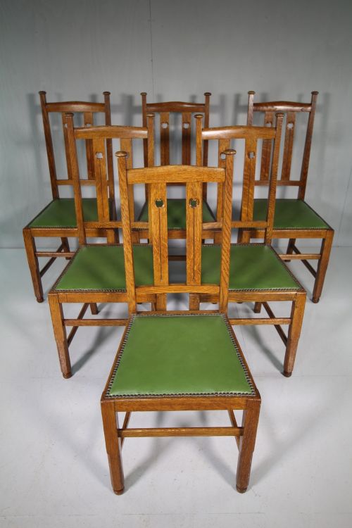 Set of Six Antique Oak Dining Chairs by Wylie & Lockhead.