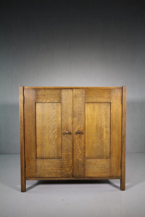 Edwardian Antique Heals Letchworth Oak Cupboard.
