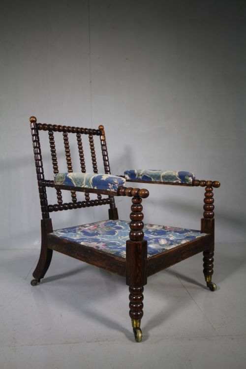 Regency Antique Simulated Rosewood Armchair.