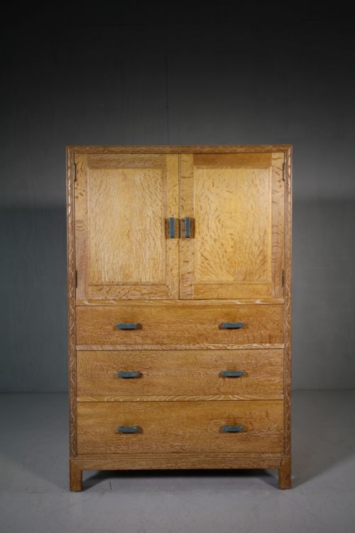 1920'S Heals of London Oak Tall Boy Cupboard.