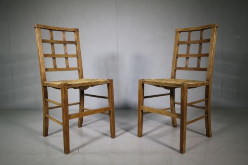 Pair of Heals Antique Oak Chairs.