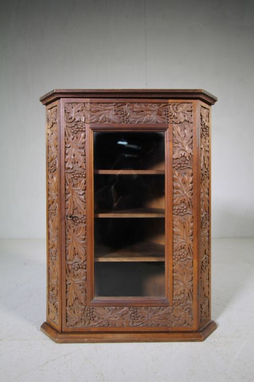 1930'S Walnut Carved Corner Cupboard by Arthur Simpson.