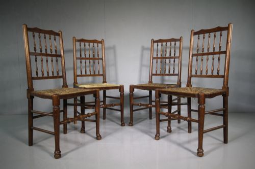 Set of Four Heals Antique Oak Country Cottage Dining Chairs.