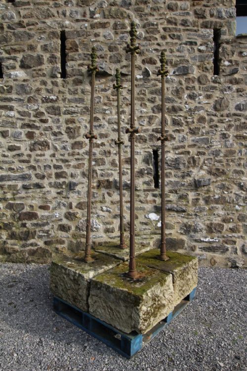 Pair of Antique Cast Iron Washing Line Poles in Stone
