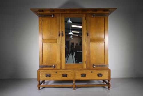Superb Large Heals of London 19th Century Newlyn Oak Antique Wardrobe-splits Up.