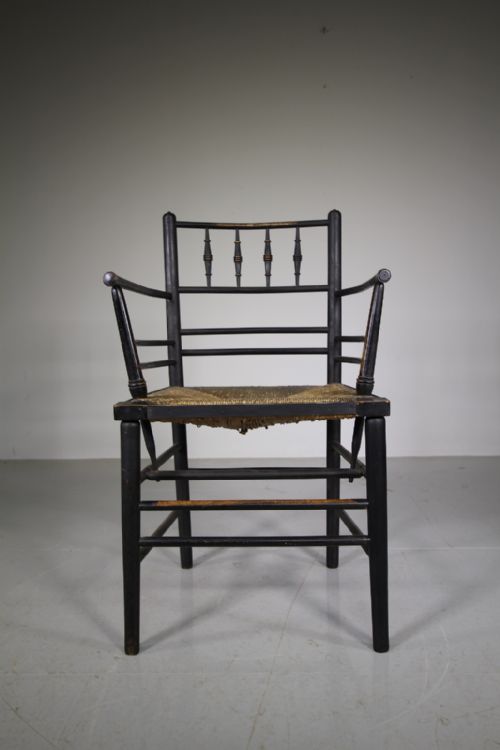A True 19th Century Ebonised Antique Sussex Armchair by William Morris