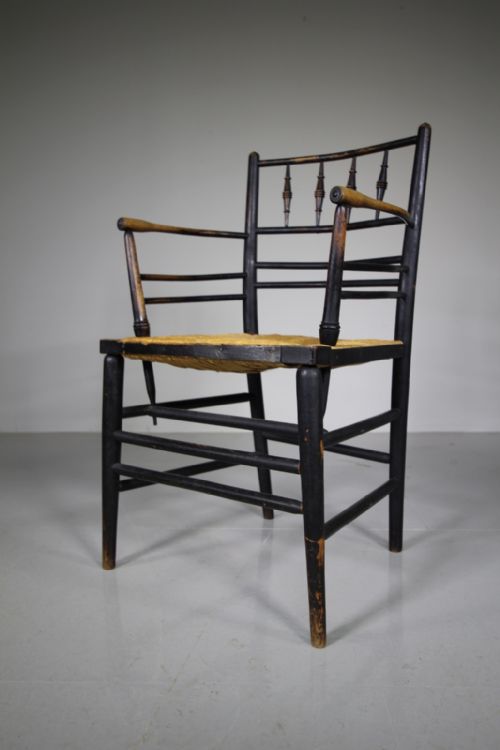 A True 19th Century Ebonised Antique Sussex Chair by William Morris