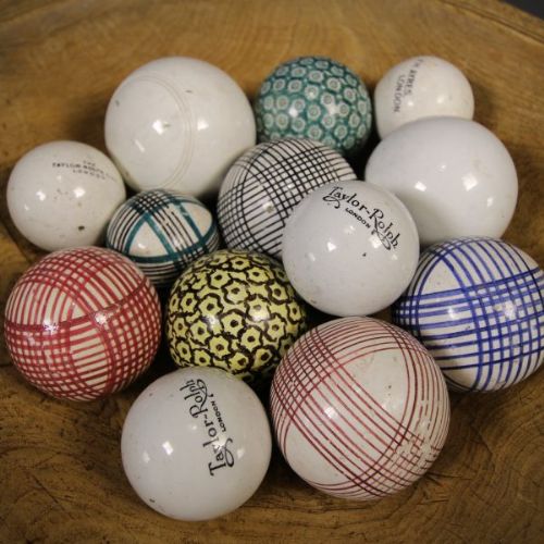 Collection of Thirteen Antique Spongeware Carpet Balls