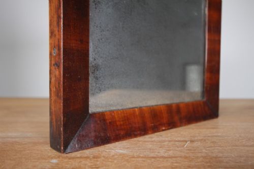 An 18th-century rectangular wall mirror featuring a rich mahogany frame with mitred corners and an oxidised glass plate. View IV