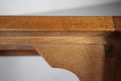 A pair of 1930s solid oak open armchairs featuring vertical slat backs, flattened armrests, and blue and white checked upholstered seats. View IV