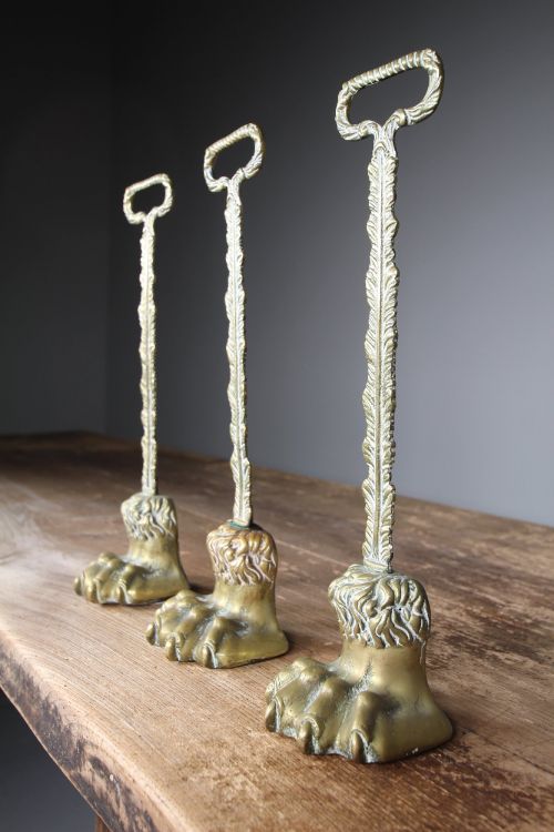 Three English 19th Century Antique Brass Lion's Paw Door Stops
