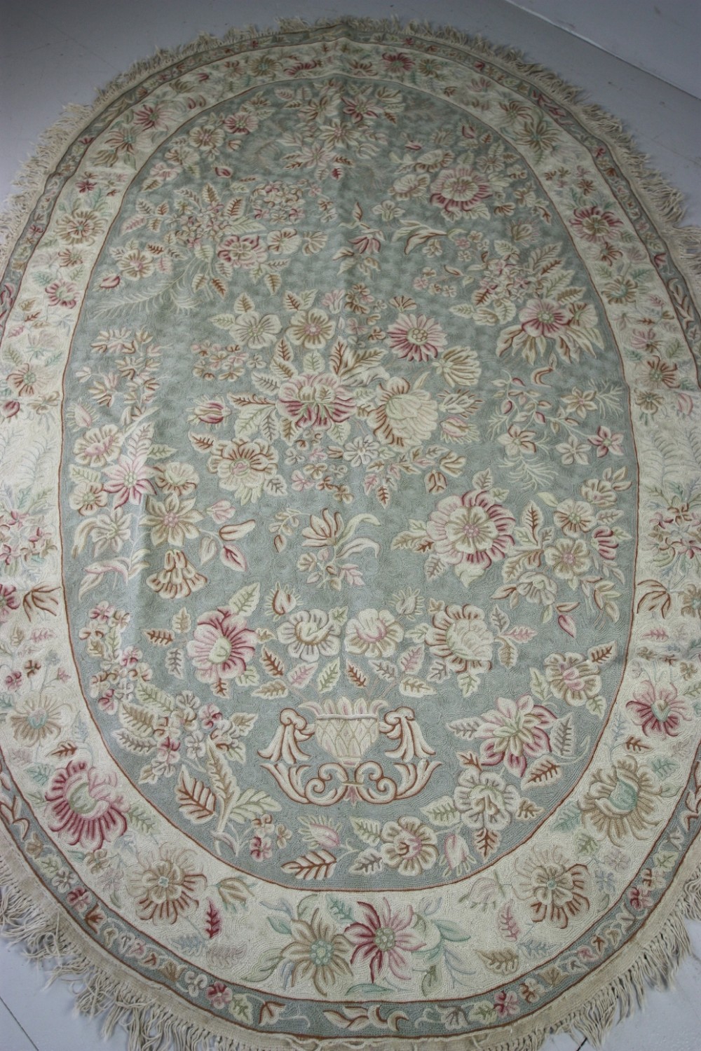 1920's Oval Hand Stitched Wool Rug.