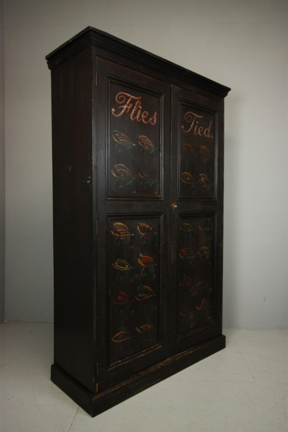 Antique Pine Cupboard Decorated with Fishing Flies. 