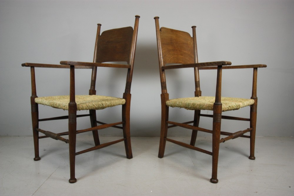 Pair of Antique William Birch Oak Armchairs.