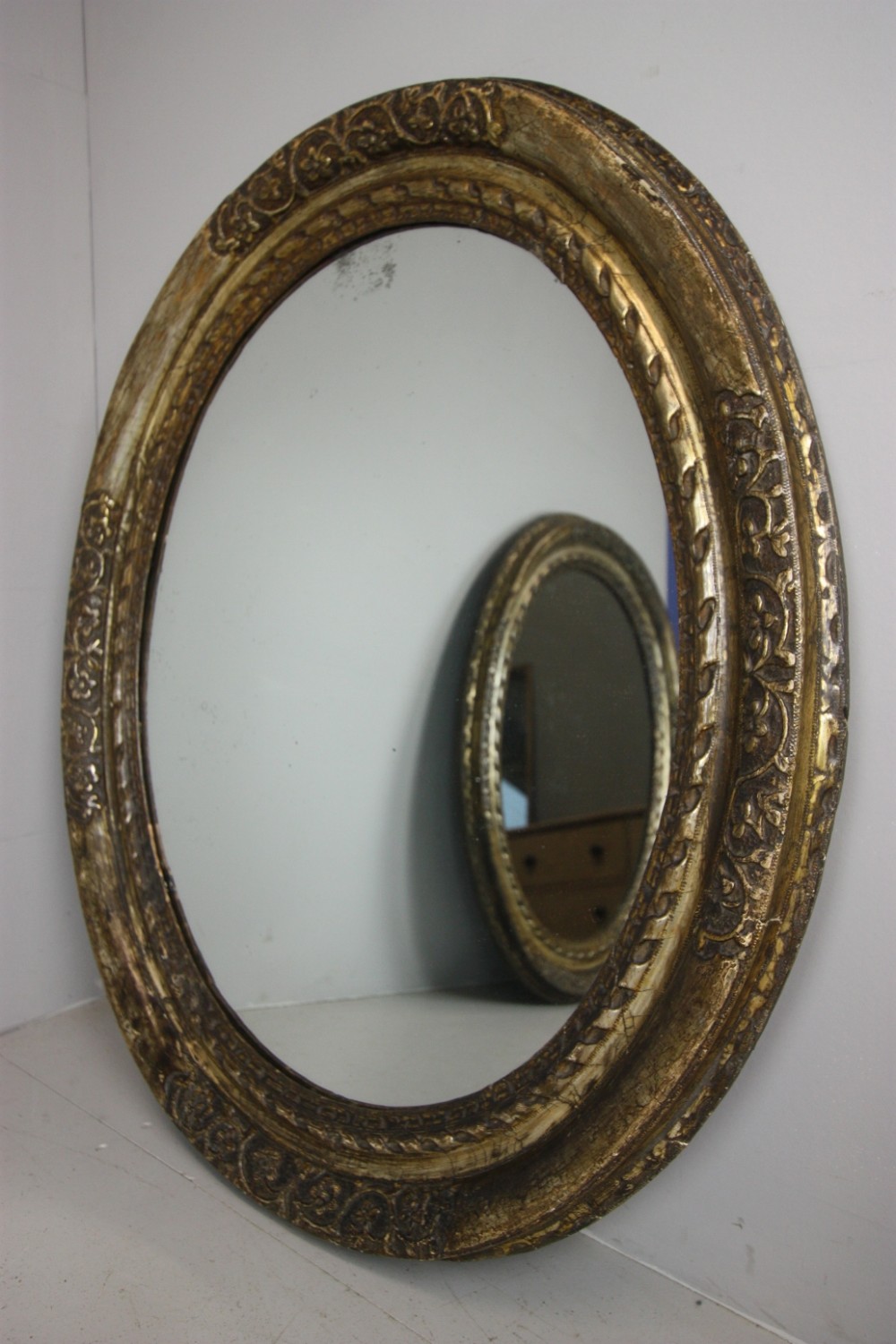 Beautiful Pair of Antique Oval Silver Gilt Mirrors.