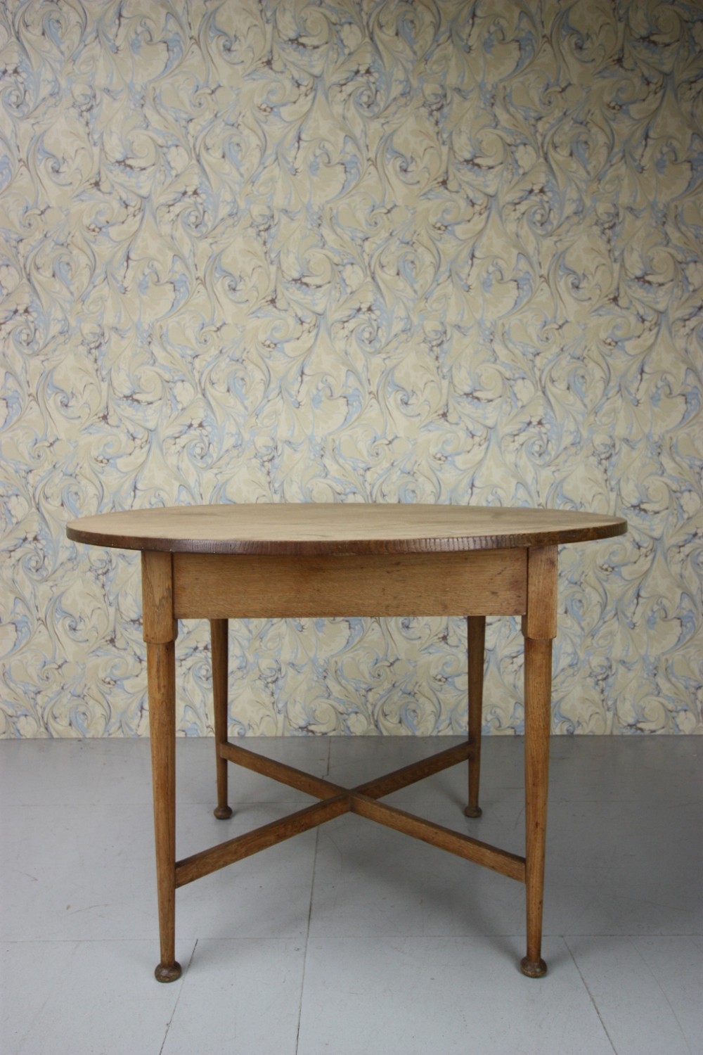 1920's Circular Oak Dining Table by Heals.