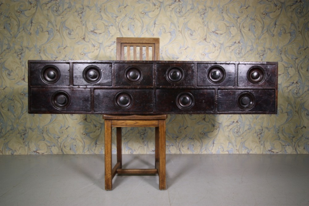 English Bank of Antique Apothecary Drawers in Mahogany.