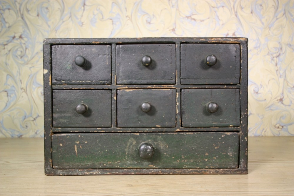 English Antique Bank of Apothecary Drawers in Original Paint.