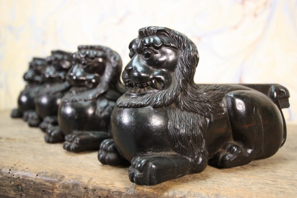 Four Georgian Antique Ebony Carved Lions.