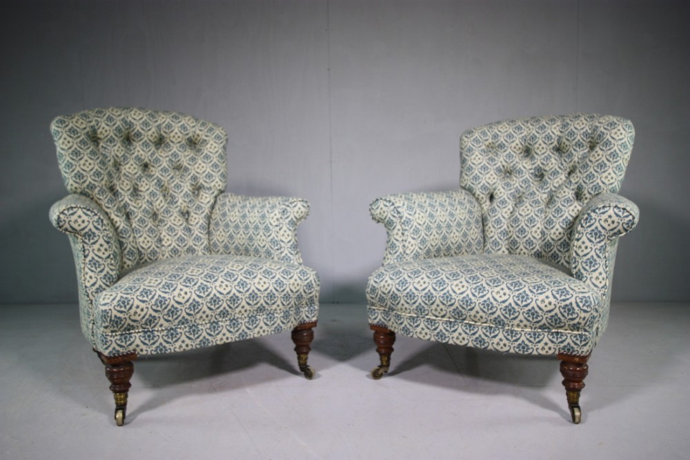 Pair of 19th Century Antique Howard & Sons Armchairs.