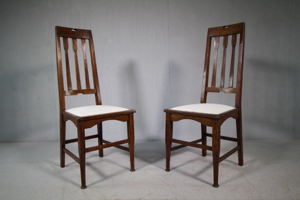 Pair of Arts & Crafts Oak Chairs by E.A.Taylor for Wylie & Lockhead.