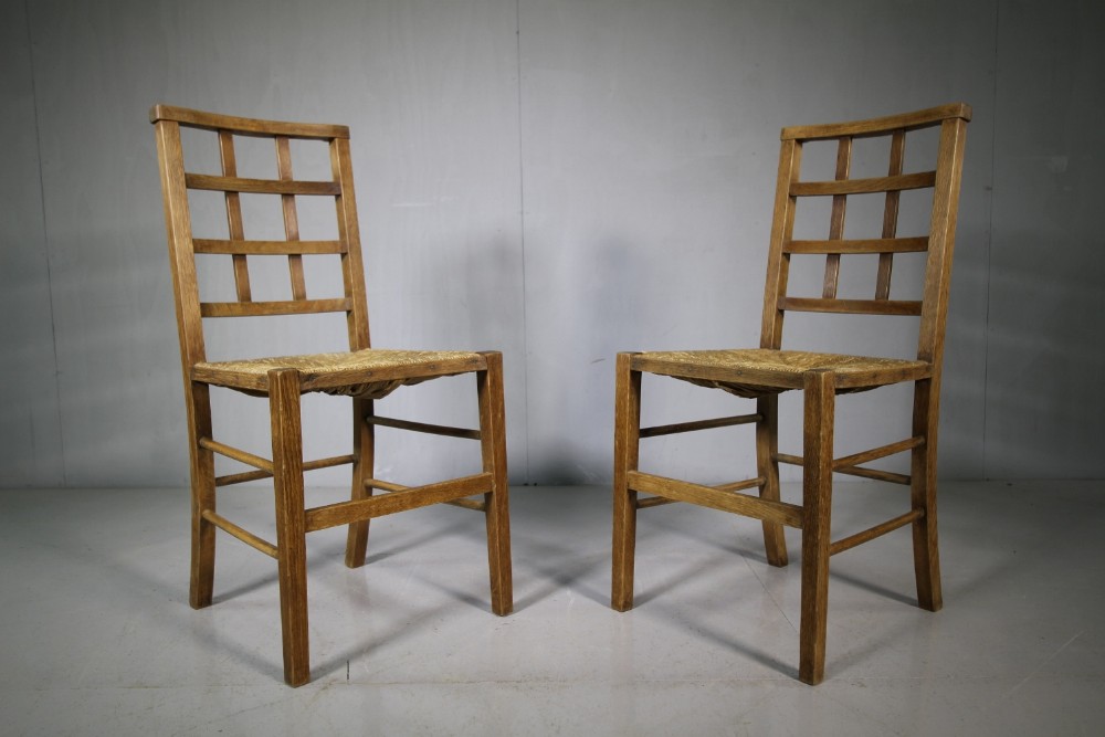 Pair of Heals Antique Oak Chairs.