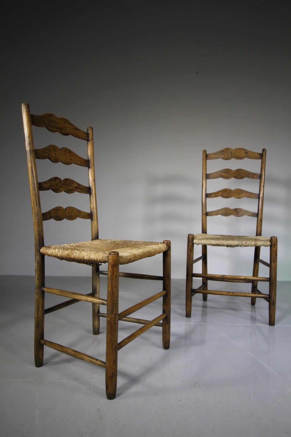 Pair of Antique Pass High Back Chairs by Neville Neal