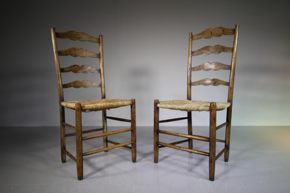 Pair of Antique Pass High Back Chairs by Ed Gardiner