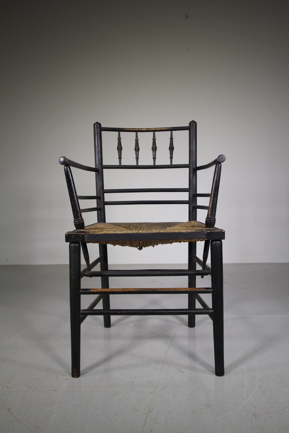 A True 19th Century Ebonised Antique Sussex Armchair by William Morris