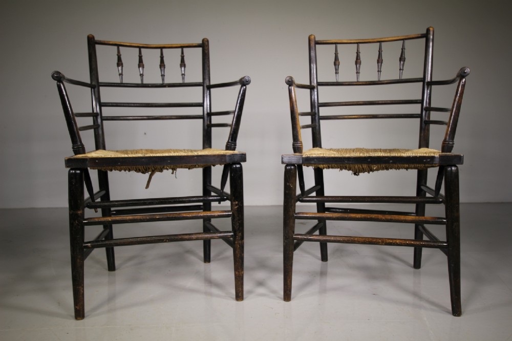 A Rare True Pair 19th Century Ebonised Antique Sussex Chairs by William Morris