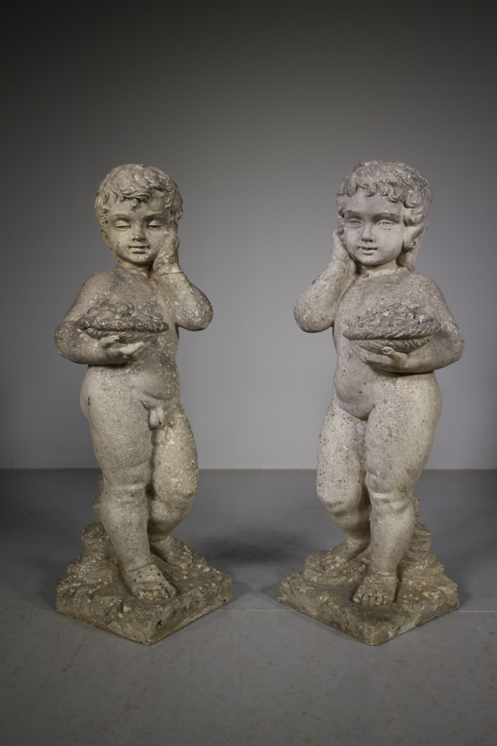 Pair of Large English 1930’s Stone Garden Figures