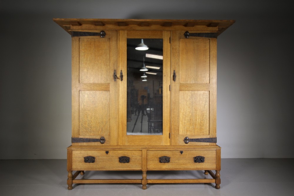 Superb Large Heals of London 19th Century Newlyn Oak Antique Wardrobe-Splits Up.