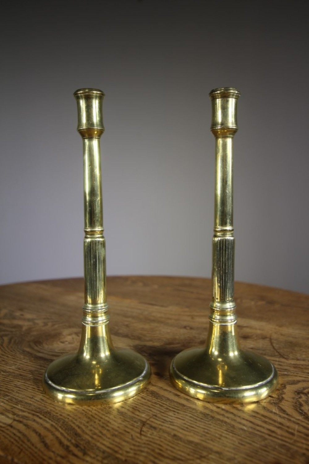 Pair of English Georgian Antique Brass Candlesticks