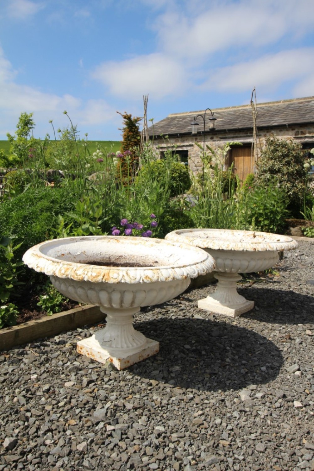 Pair of Antique Cast iron Garden Urns of Large Proportions