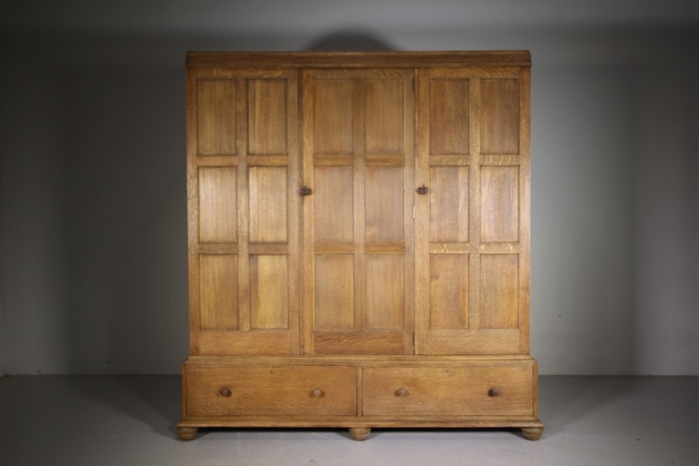 
Early Heals Edwardian Antique Oak Triple Wardrobe