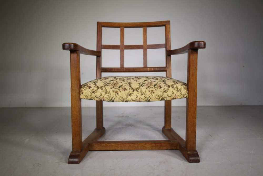 Antique Oak ‘Fireside Chair’ by Heals of London