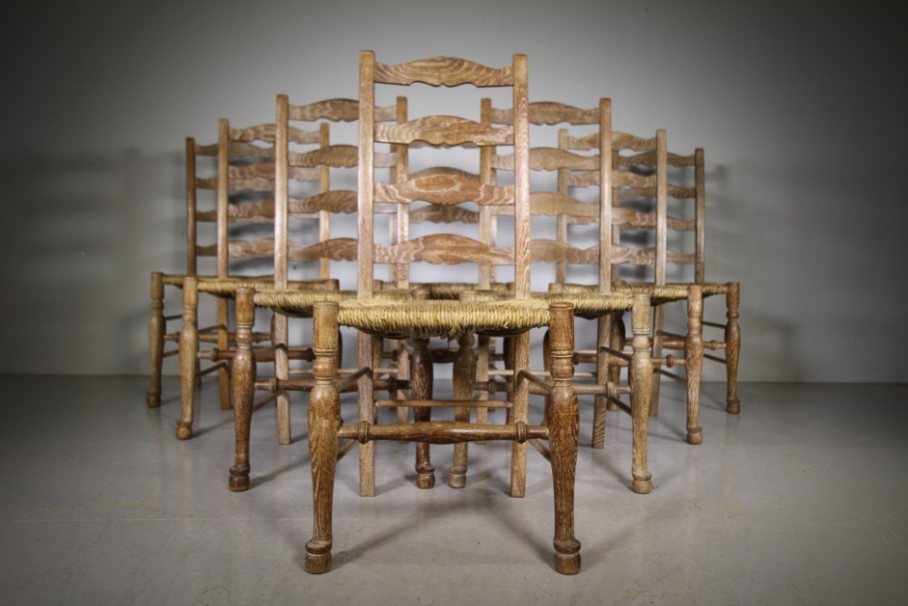 

Set of Eight Heals of London Antique Oak Dining Chairs