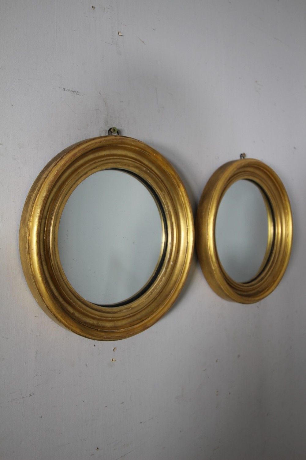 Pair of English Antique Gilt Convex Wall Mirrors 