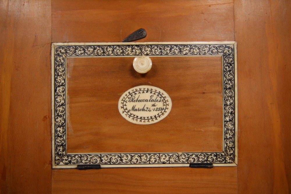 An antique sarcophagus-shaped porcupine quill box with engraved bone borders and bun feet. View VII