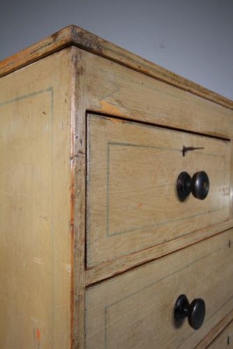 A Regency original painted pine chest of drawers featuring two short over two long drawers, turned legs, dark knobs, and hand-painted border lines. View VIII