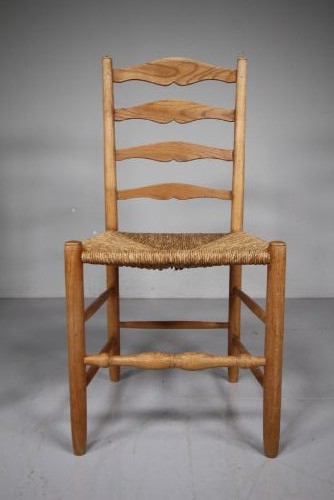 A pair of 1920s Arts and Crafts oak side chairs with ladderback frames and woven rush seats. View IV