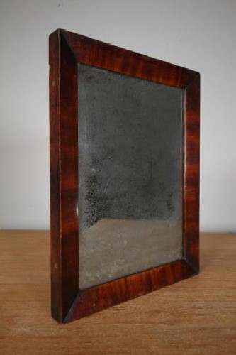 An 18th-century rectangular wall mirror featuring a rich mahogany frame with mitred corners and an oxidised glass plate. View II