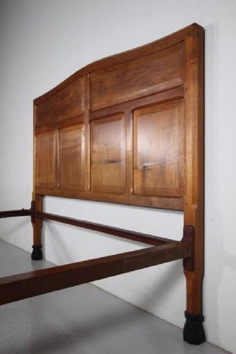A 1920s pale walnut double bed frame featuring framed panelwork on both the headboard and footboard. View II