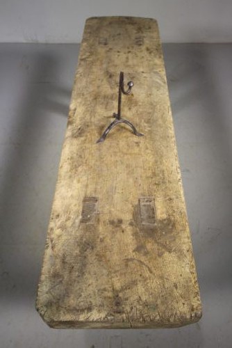 A low, thick-topped Georgian oak pig bench with four rustic splayed legs displaying a natural weathered finish. View II